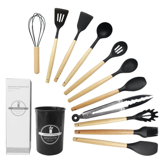 Set of kitchen utensils with wooden handles and a black container on a white background.