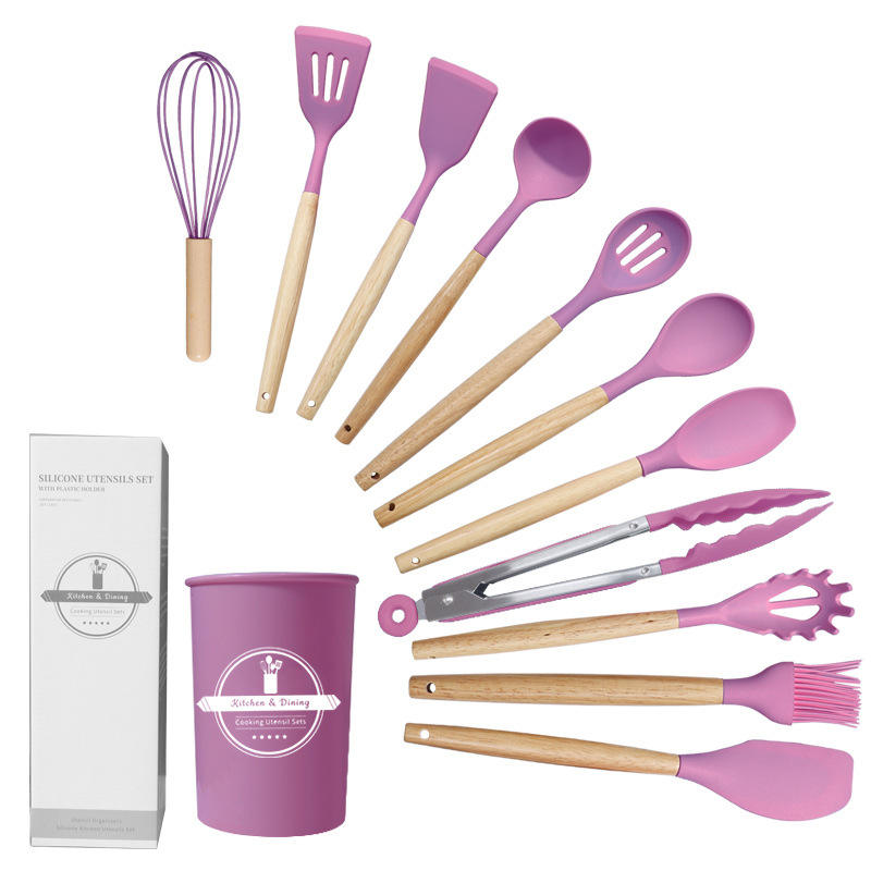 Purple kitchen utensils set with wooden handles and a purple container